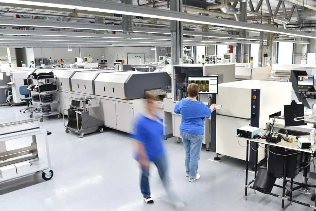 Factory shopfloor production with personnel walking around