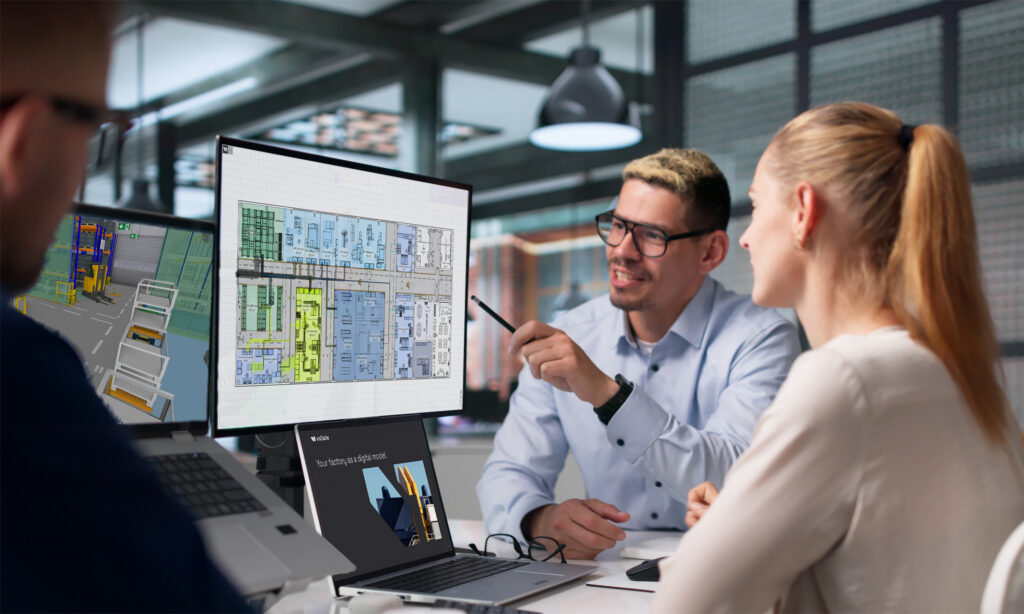 3 people sit in front of two laptops and one monitor. they look at a visTable 2D and 3D layout as well as a visTable Homescreen